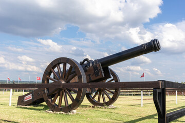 A large medieval cannon on wheels.