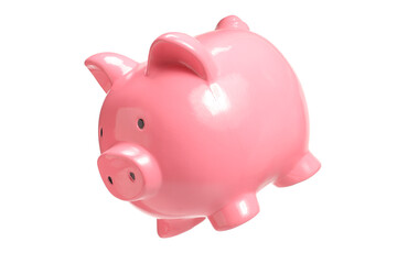 Studio shot of a pink piggy bank falling