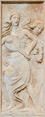 PERUGIA, ITALY - MAY 16, 2024: The relief of angels with the guitar (alegory) on the facade of church Oratorio dei Santi Andrea e Bernardino by  Agostino di Duccio  (1418 – 1481).