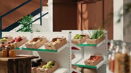 Fresh fruits and veggies in crates on display at farmers market. Freshly harvested additives free produce sold in local neighborhood grocery store, sustainable lifestyle zero waste shop.