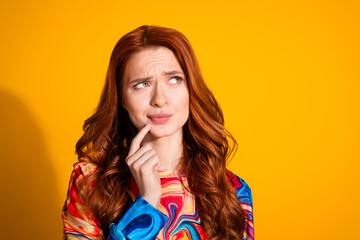 Photo portrait of pretty young girl look skeptical empty space wear trendy colorful outfit isolated...