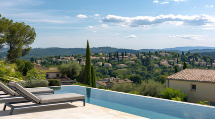 Fototapeta premium Infinity outdoor pool with modern sun loungers