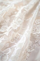 Close-up of a vintage lace fabric with floral designs. Fabric with floral patterns and a romantic touch in a bridal concept.