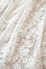 Close-up of a vintage lace fabric with floral designs. Fabric with floral patterns and a romantic touch in a bridal concept.