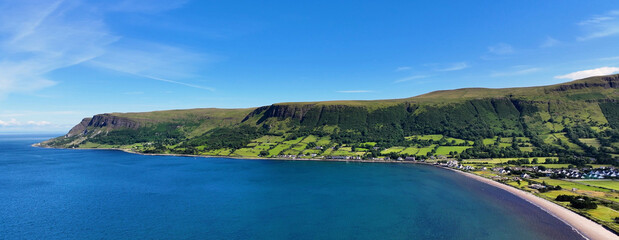 Panoramic aerial view of Glenariff Glen on the Irish Sea Co Antrim Northern Ireland on sunny day with a blue sky