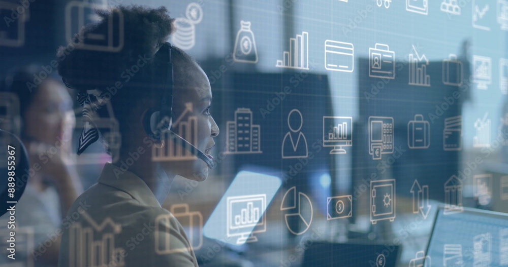 Canvas Prints Image of business icons over african american businesswoman using headset and laptop at office