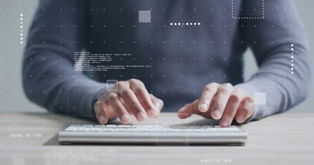 Image of data processing over midsection of biracial man using computer keyboard at desk