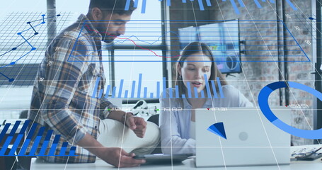 Image of charts processing data over diverse female and male colleague talking at casual office