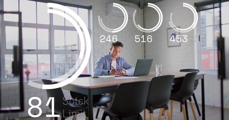 Image of financial data processing over latino businessman in office