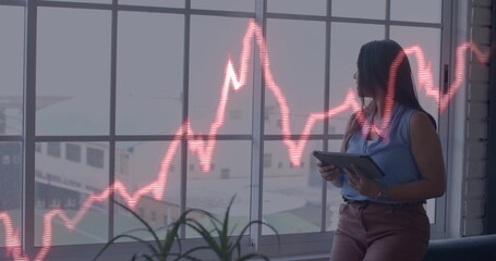 Image of financial data processing over biracial businesswoman in office