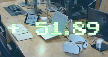 Image of financial data processing over computer on office desk