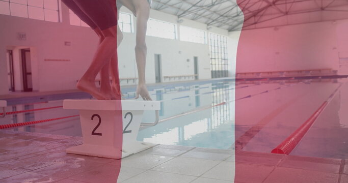 Image of flag of peru over biracial male swimmer
