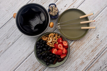 Chocolate, strawberry, chestnut and walnut fondue