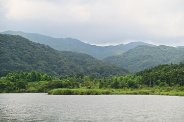 Immerse yourself in the tranquility of Shuanglian Pi (雙連埤), Taiwan, where nature's wonders unfold amidst verdant hills and serene waters.