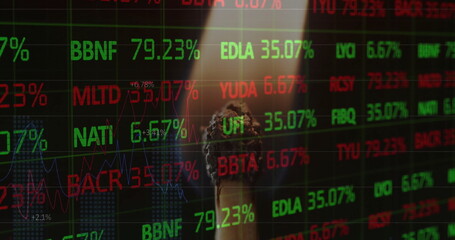 Image of financial data processing over lit match