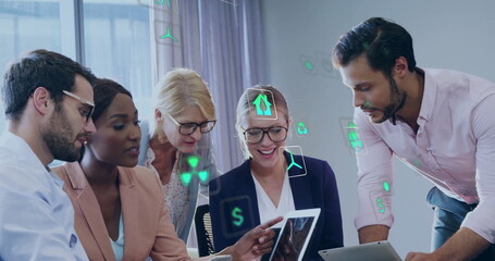 Image of ecology icons over diverse colleagues using technology in office