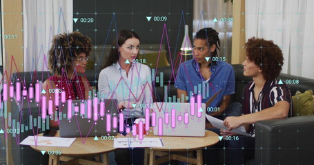 Image of graph processing data over diverse colleagues with laptops at casual office meeting