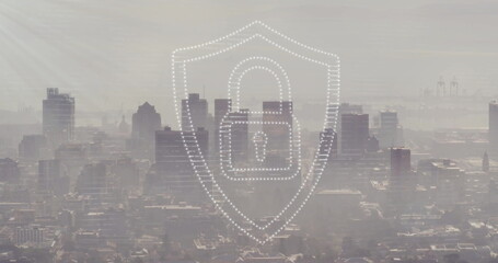 Image of padlock and shield icon over modern cityscape