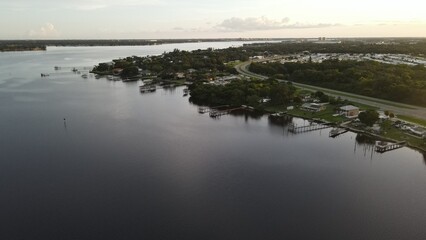 private boat docks and a view down the Manatee River at sunset