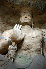 The Yungang Grottoes in Shanxi Province, China, began to be excavated during the Northern Wei...