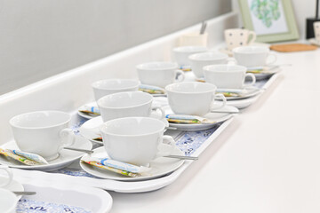 Neatly Arranged Coffee Cups with Perfectly Prepared Coffee Set
