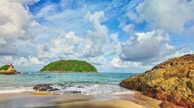 Slow motion video of the waves hitting the reef along Yanui Beach. The aqua blue sea.
the clean sea and quiet with white sand beach. Amazing place of tourist attractions. Snorkeling location.