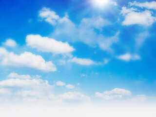 Obraz premium Blue Sky with Soft Clouds and Gentle Sunlight（ふんわりした日光が降り注ぐふんわりした雲がたくさんある青空）