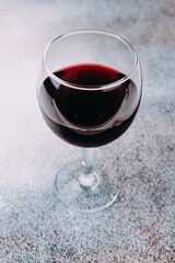 A glass of red wine, close-up. Copy space.