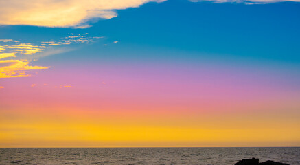 Enjoy a panoramic view of the skyline. The sun rises in the morning sky with colorful clouds. and beautiful cloud patterns In the soft light of the morning	