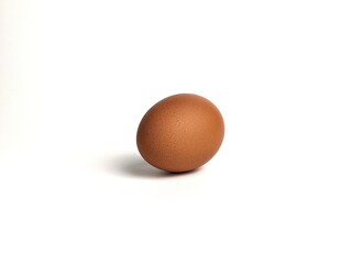 Brown chicken eggs isolated against white background