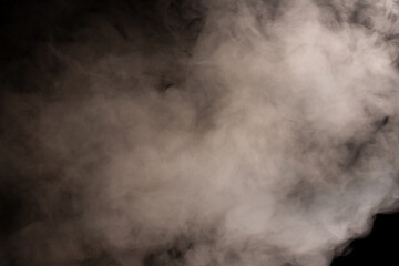 White steam on a black background.