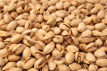 Tasty pistachios isolated on a white background.