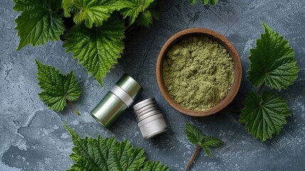 Fototapeta premium Studio shot photo of an inhaler next to stinging nettle and green nettle powder in a bowl