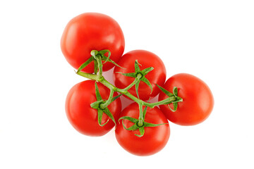 Red, fresh tomatoes on a branch isolated on a white background. Full depth of field.