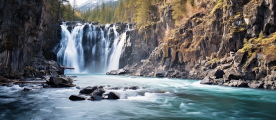 Waterfall and River in a Mountainous Landscape