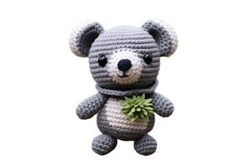 A Sweet Grey And White Crochet Koala Toy With A Green Plant on a Clear PNG or White Background.