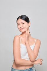 A female model touching her clear and clean face. Korean cosmetics female model.