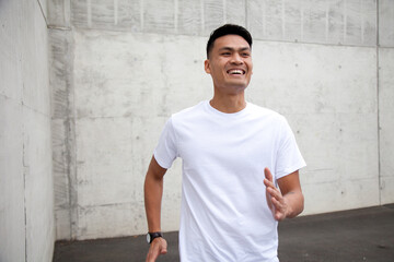 Happy young male in white t-shirt