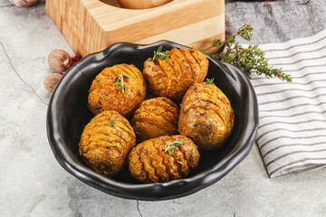 Baked baby potato with thyme