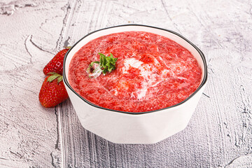 Strawberry soup with strachatella cheese