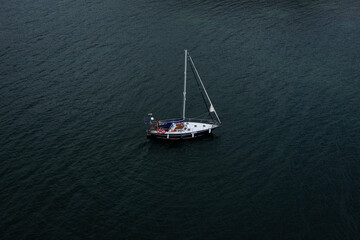 Aerial view to sailing yacht in the sea