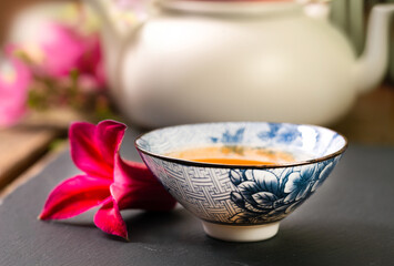 Chinese teapot and teacups with tea