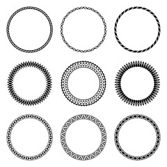 Vector collection of round black frames isolated on white background. Set of circles, simple geometric patterns. For the design of plates, vignettes, albums, greeting cards, printing on paper, textile