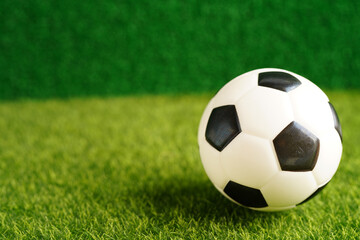 Gold bitcoin with soccer ball or football, cryptocurrency used in online sports betting.