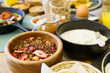 Granola with dried strawberry, seeds and yoghurt
