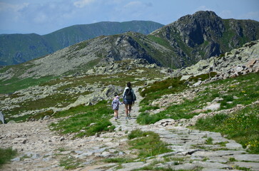 Fototapeta premium A stunning view of the High Tatras mountain range in Slovakia, captured along the popular hiking trail from Štrbské Pleso to Popradské Pleso
