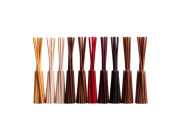 A Row of Scented Reed Diffusers in a Spectrum of Colors on a Clear PNG or White Background.