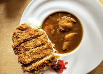 Chicken curry and fried pork Japanese food