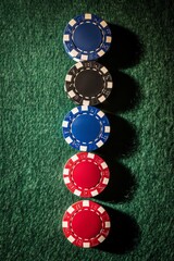 Stack of Casino Chips on Green Felt