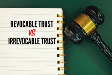 Judge's hammer and book with the words Irrevocable Trust vs Revocable Trust